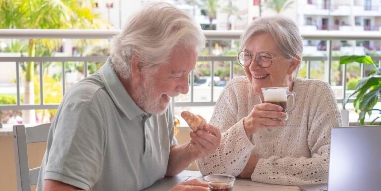 Senior Couple Having a Good Breakfast At Assisted Living Facility