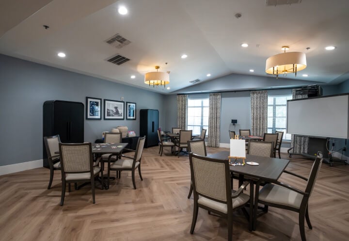 Communal Dining Area of Seniors in Memory Care Community Communal Dining Area of Seniors in Memory Care Community