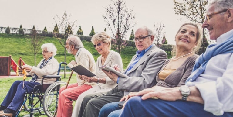 Senior Women Participating in a Group Activity at an Assisted Living Facility.